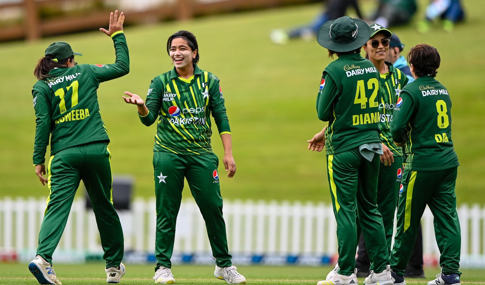 Pakistani women cricket team players celebrate a wicket during their T20i match against New Zealand in Dunedin, New Zealand on December 3, 2023. (Photo courtesy: @TheRealPCB_Live/X)