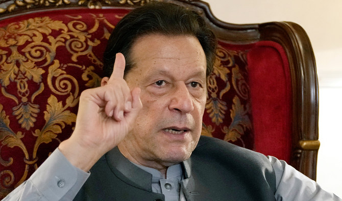 Pakistan's former Prime Minister Imran Khan gestures during talk with reporters regarding the current political situation and the ongoing cases against him at his residence, in Lahore, Pakistan, on August 3, 2023. (AP/File)
