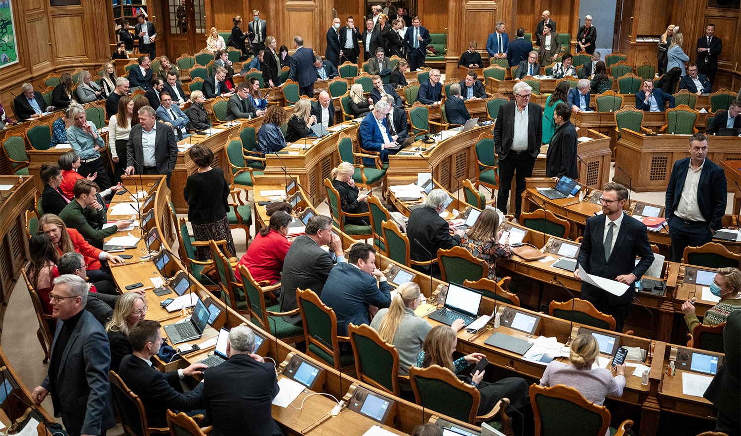 Members of the Danish Parliamant Folketinget attend the debate on a new law against inappropriate treatment of writings of importance to religious communities, in Copenhagen, Denmark, on December 7, 2023. (AFP)