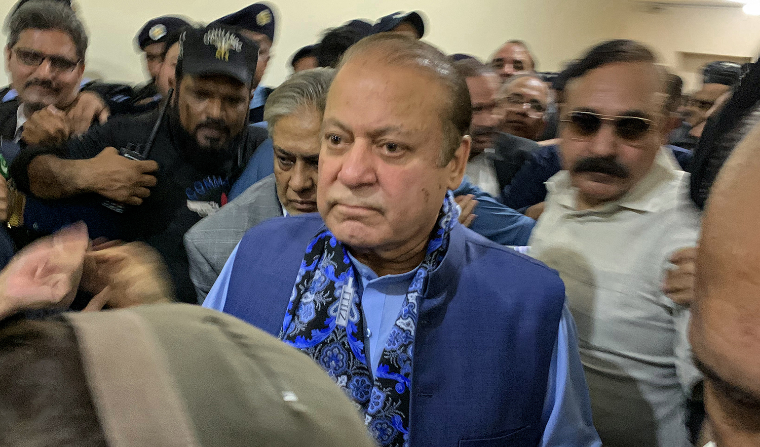 Former Pakistan Prime Minister and graft convict Nawaz Sharif, center, arrives to appear before the court in Islamabad on October 24, 2023. (AFP/File)