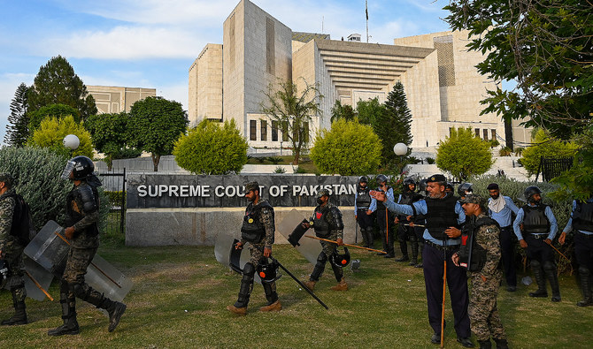 In this file photo, taken on May 11, 2023, Paramilitary soldiers stand guard outside the Supreme Court of Pakistan in Islamabad. (AFP/File)