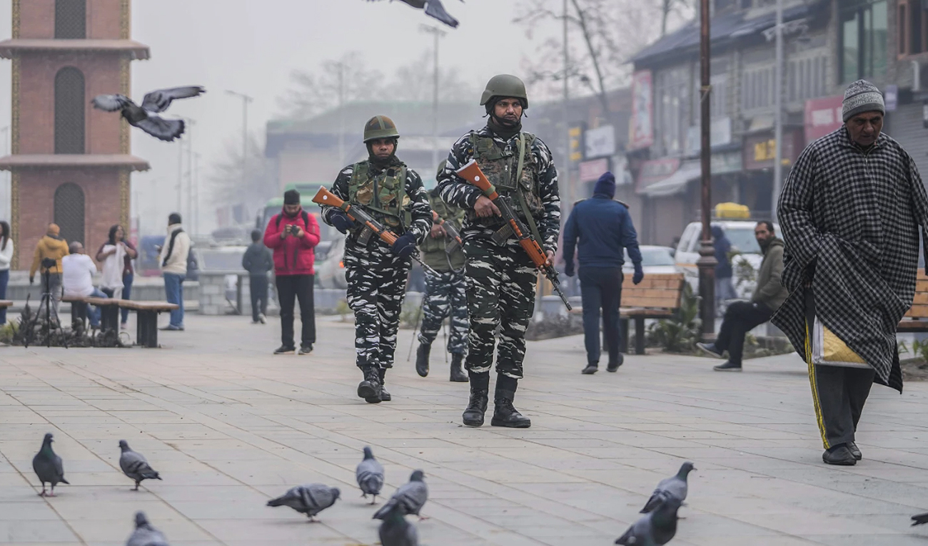 Indian paramilitary soldiers patrol at the main market in Srinagar, Indian administered Kashmir on December 11, 2023. (AP)