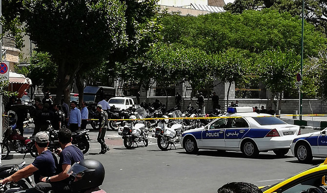 A picture taken on June 7, 2017 shows police vehicles and motorcycles outside Iranian parliament in the capital Tehran. (Photo courtesy: AFP/File)