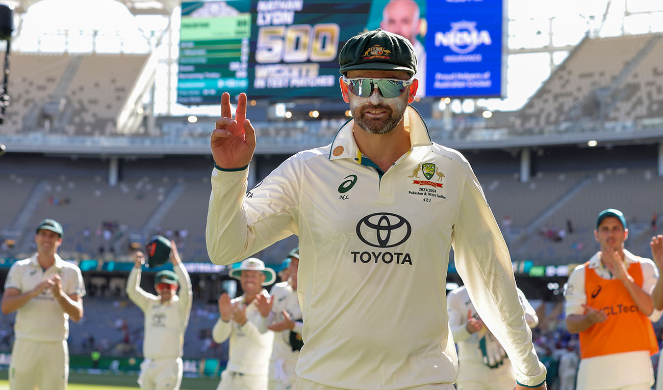 Australia's Nathan Lyon gestures as he leaves the field at the end of play on the fourth day of the first cricket test between Australia and Pakistan in Perth, Australia, Sunday, Dec. 17, 2023. Lyon took his 500th test wicket in Australia's 360 run win over Pakistan. (AP)