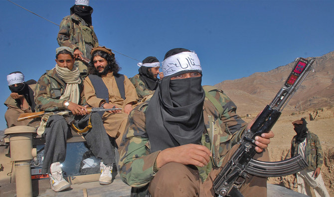 Armed militants of Tehreek-e-Taliban Pakistan (TTP) pose for a photograph in Orakzai Agency, Pakistan, on November 26, 2008. (AFP/File)