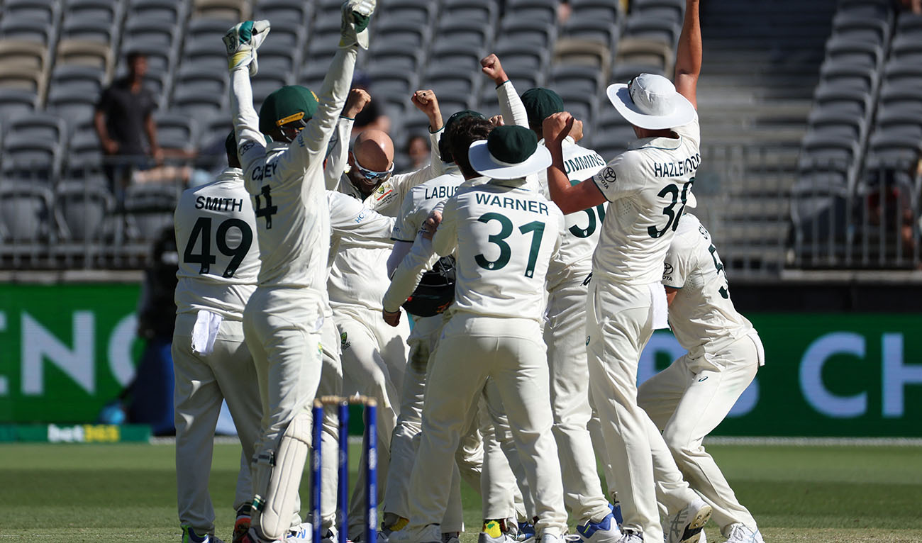 Australia's Nathan Lyon (centre L) celebrates with teammates after taking his 500th wicket, Pakistan's Faheem Ashraf, during day four of the first Test cricket match between Australia and Pakistan in Perth on December 17, 2023. (AFP/File)