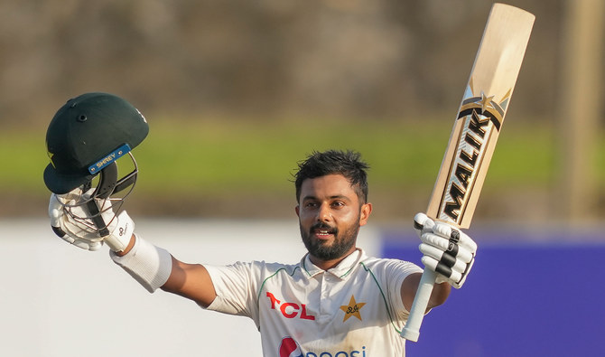 Pakistan's Saud Shakeel celebrates scoring a double century during the third day of the first cricket test match between Sri Lanka and Pakistan in Galle, Sri Lanka, on July 18, 2023. (AP)