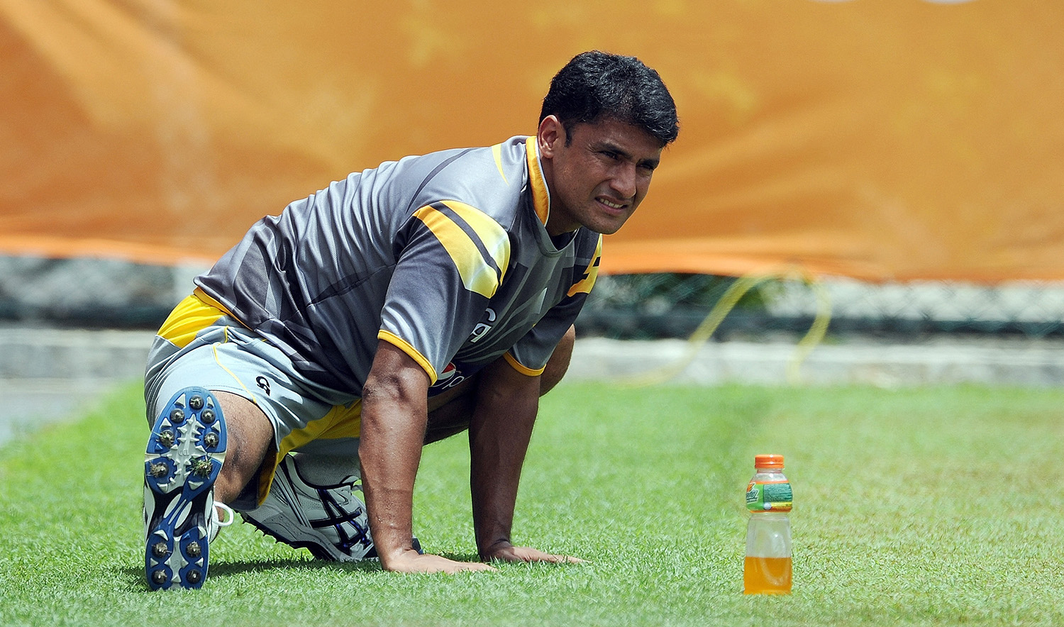 Pakistan cricketer Yasir Arafat warms up during a training session at the Pallekele International Cricket Stadium in Pallekele, Sri Lanka on September 24, 2012. (AFP/File)