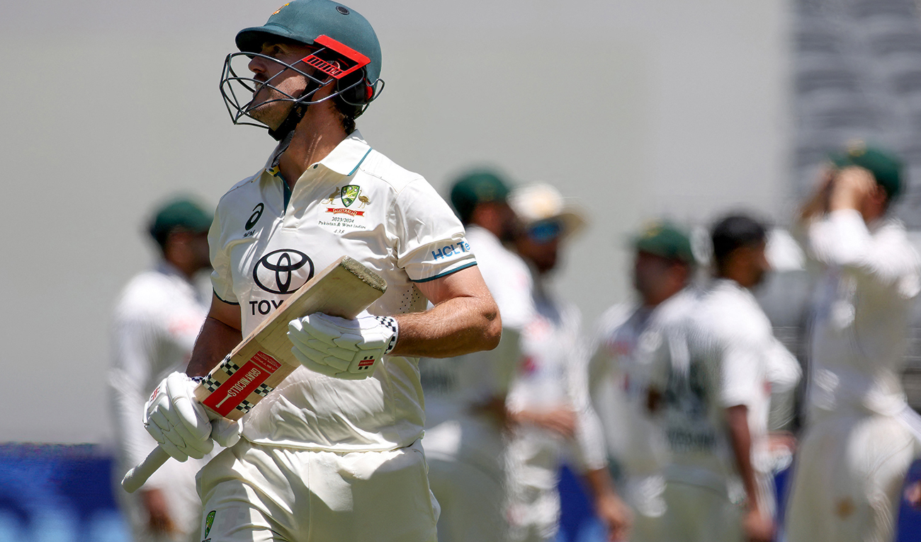 Australia’s Mitchell Marsh reacts after being bowled by Pakistan's Khurram Shahzad on the second day of the first Test cricket match between Australia and Pakistan in Perth on December 15, 2023. (AFP)