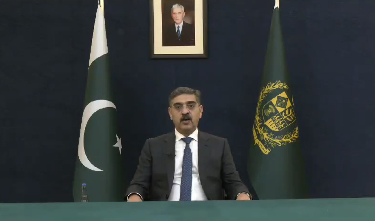 Pakistan Prime Minister Anwaar-ul-Haq Kakar speaks during a televised address, announcing a ban on New Year celebrations in the wake of the war on Gaza, in Islamabad on December 28, 2023. (Photo courtesy: PMO)