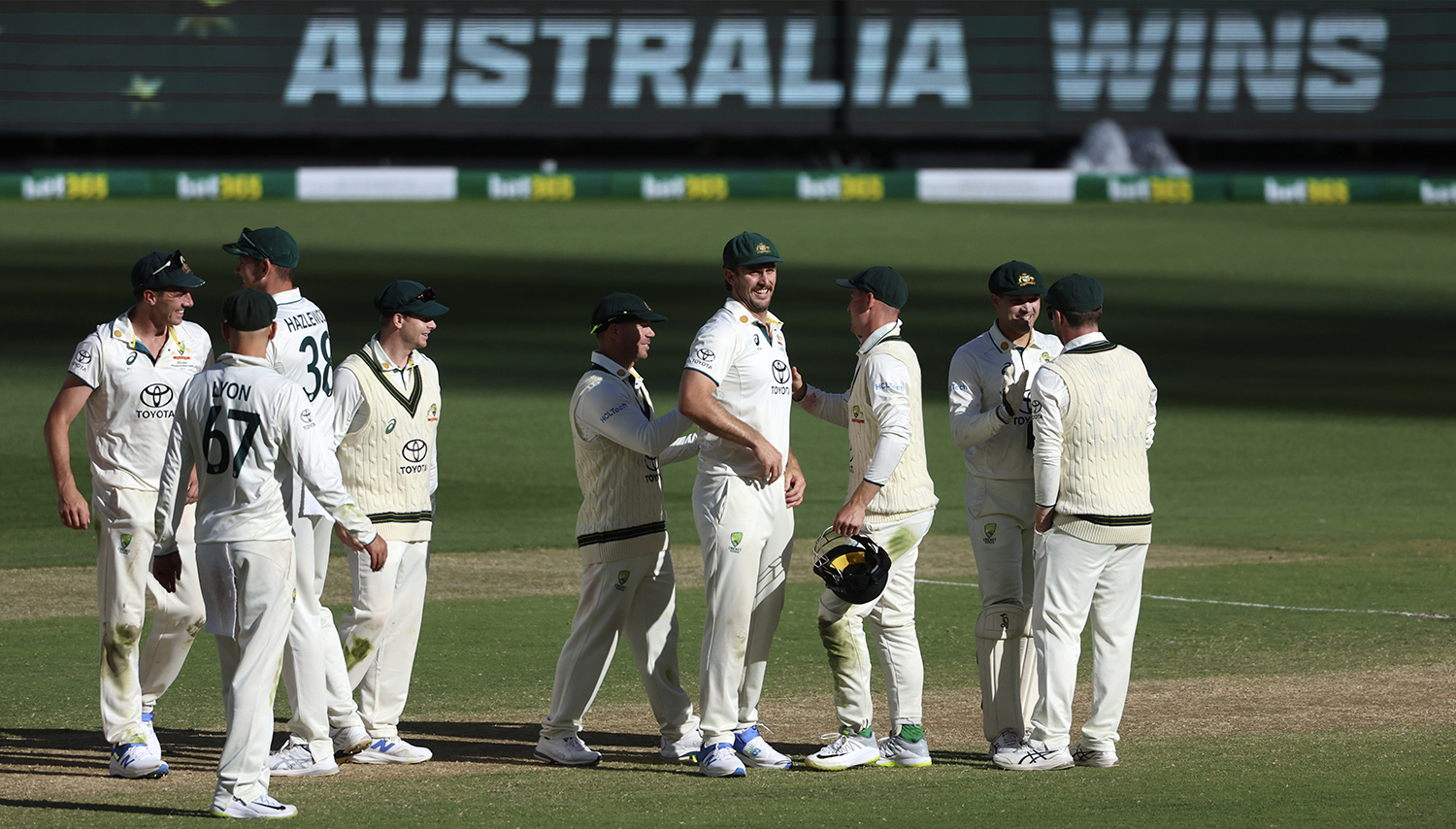 Australian players celebrate their victory over Pakistan on the fourth day of their cricket test match in Melbourne, Australia on December 29, 2023. (AP)