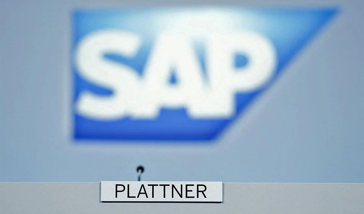 The logo and the plate with the name of the chairman of the Supervisory Board of German software group SAP Hasso Plattner is pictured at the beginning of SAP's annual general meeting, in Walldorf, southwestern Germany, on May 18, 2022. (AFP/File)
