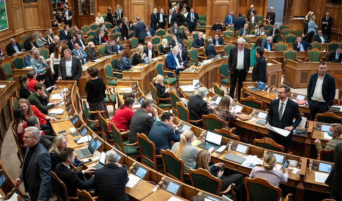 Members of the Danish Parliamant Folketinget attend the debate on a new law against inappropriate treatment of writings of importance to religious communities, in Copenhagen, Denmark, on December 7, 2023. (AFP)