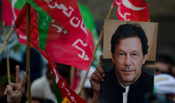 Activists of opposition party Pakistan Tehreek-e-Insaf (PTI) take part of anti-government rally demanding early election in Karachi on October 28, 2022. (AFP/File)
