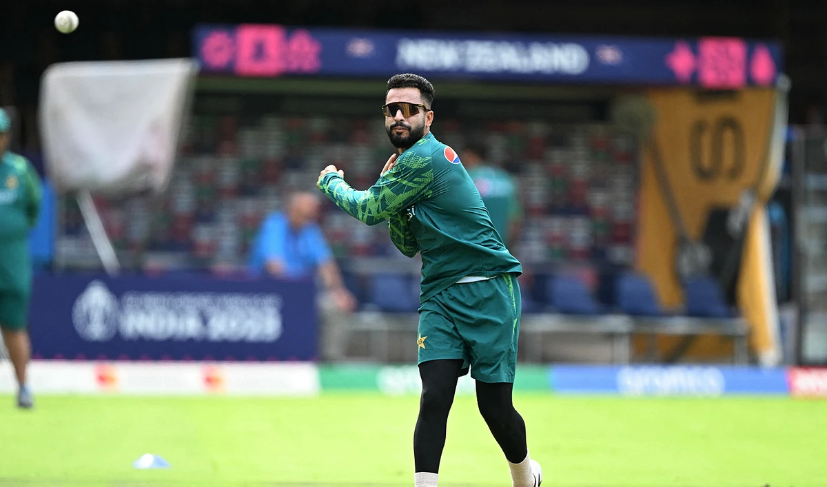 In this file photo, taken on November 3, 2023, Pakistan's team player Mohammad Nawaz throws a ball during a practice session at the M. Chinnaswamy Stadium in Bengaluru. (AFP/File)