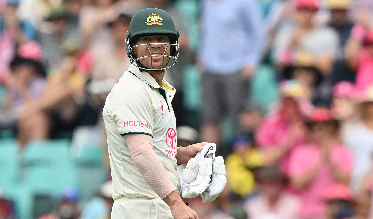Australia's David Warner walks off the field after his dismissal during the second day of the third cricket Test match against Pakistan at the Sydney Cricket Ground in Sydney on January 4, 2024. (AFP)