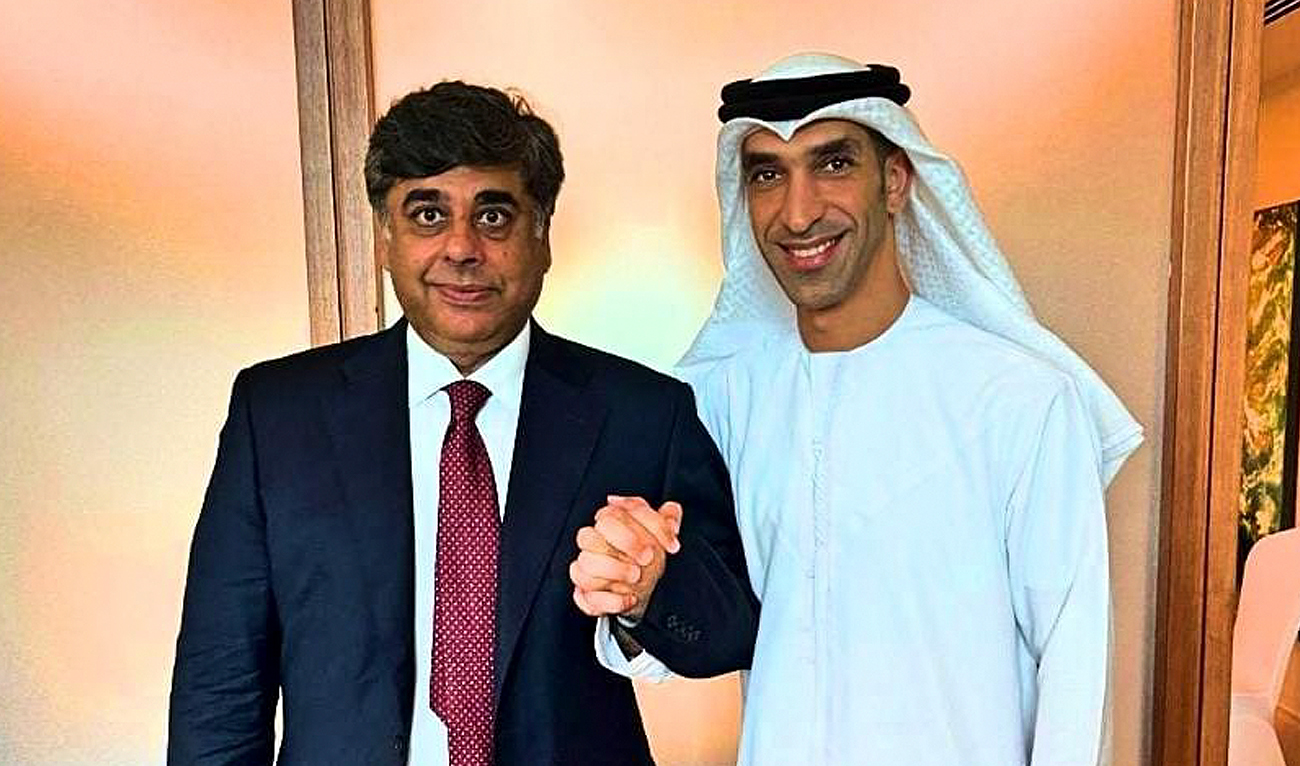 In this handout photo, taken and released by Ministry of Commerce, Pakistan's interim commerce minister, Dr. Gohar Ejaz (left), gestures with UAE’s state minister for foreign trade Dr. Thani Ahmed Al Zeyoudi following a meeting in Abu Dhabi on January 6, 2024. (Photo courtesy: GOP)
