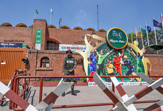A soldier stands guard outside the Gaddafi Cricket Stadium in Lahore, Pakistan, on March 17, 2020. (AFP/File)