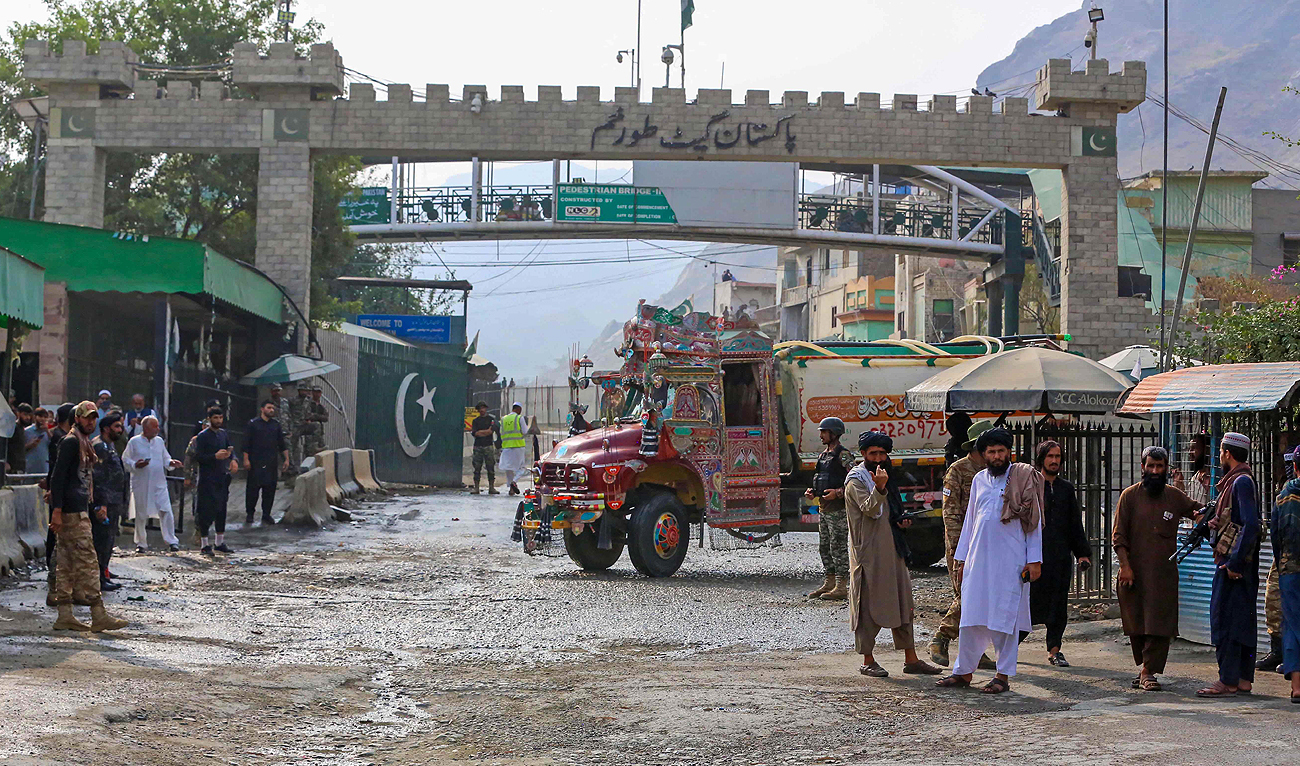 Taliban security personnel stand guard at the Pakistan-Afghanistan border in Torkham on September 15, 2023. (AFP/File)