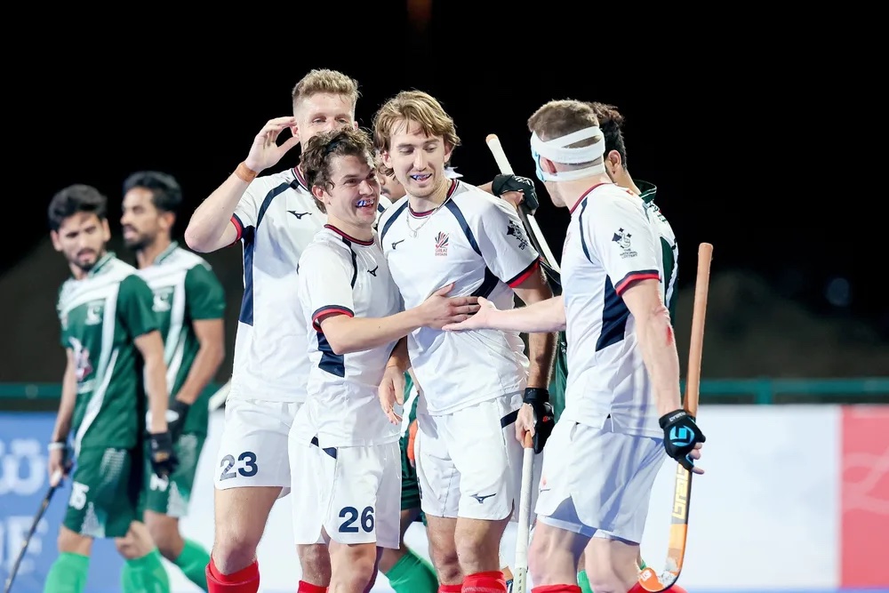 Players of Britain celebrate after winning Pakistan v Great Britain Olympics qualifier in Oman on January 15, 2024. (International Hockey Federation)