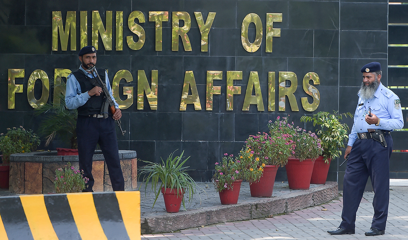 In this file photo, taken on September 2, 2019, Pakistani policemen stand guard outside Pakistan's Foreign Ministry building in Islamabad. (AFP/File)