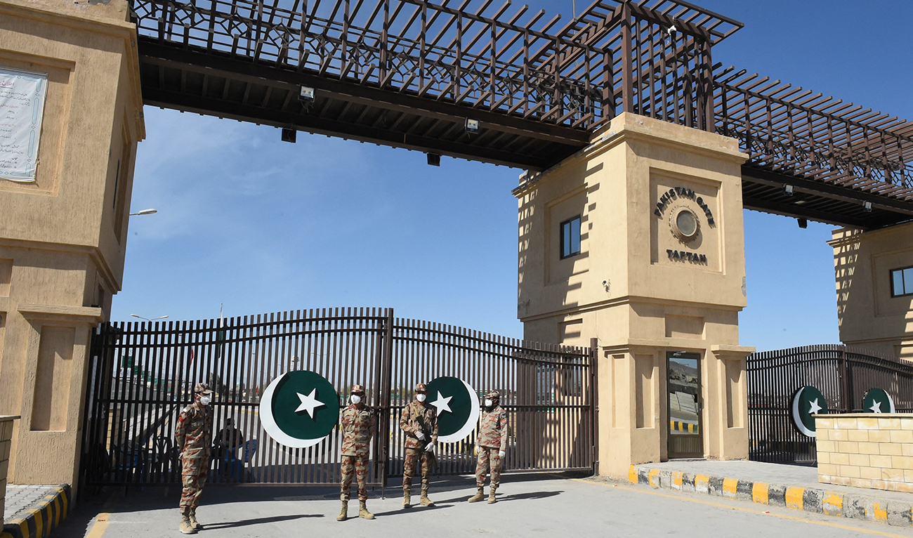 Pakistani soldiers stand guard at the closed Pakistan-Iran border in Taftan on February 25, 2020. (AFP/File)