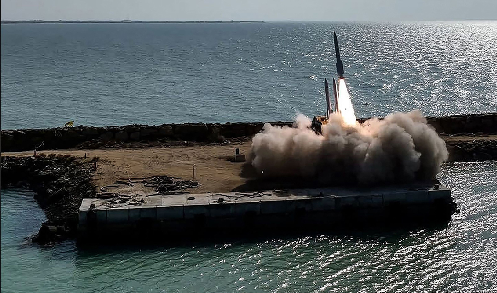 A handout picture provided by the Iranian Army media office on January 19, 2024, shows the launch of a missile during a military drill at an undisclosed location in southern Iran. (AFP/Iranian Army Media Office)
