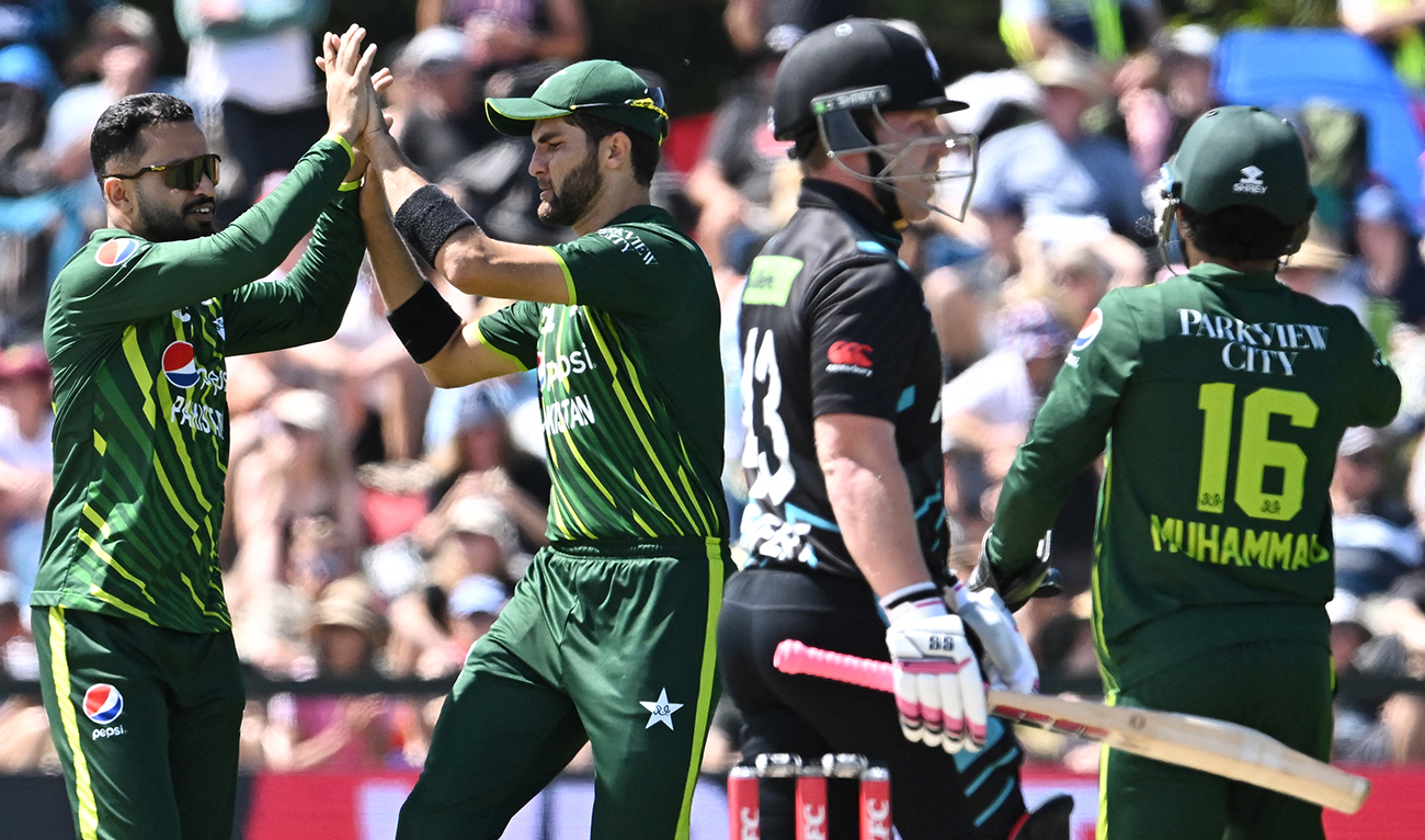 Pakistan's Mohammad Nawaz (L) celebrates with Shaheen Shah Afridi (2nd L) after taking the wicket of New Zealand's Will Young during the fifth and final Twenty20 international cricket match between New Zealand and Pakistan at Hagley Oval in Christchurch on January 21, 2024. (AFP/File)