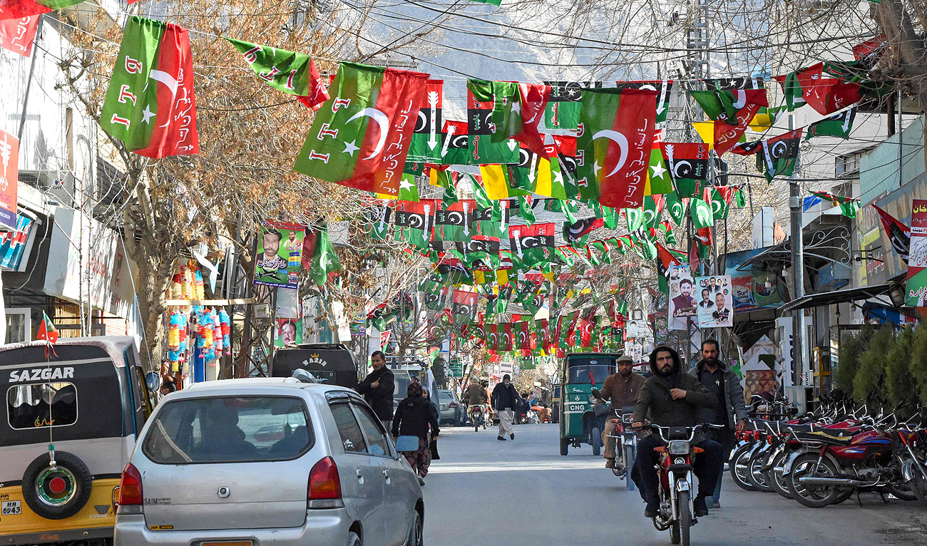 A street is festooned with flags of political parties ahead of Pakistan's national elections 2024, in Quetta on January 21, 2024. (AFP)