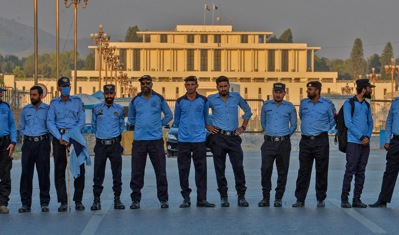 Police stand guard in front of the parliament building in Islamabad, Pakistan, on March 8, 2023. (AFP/File)