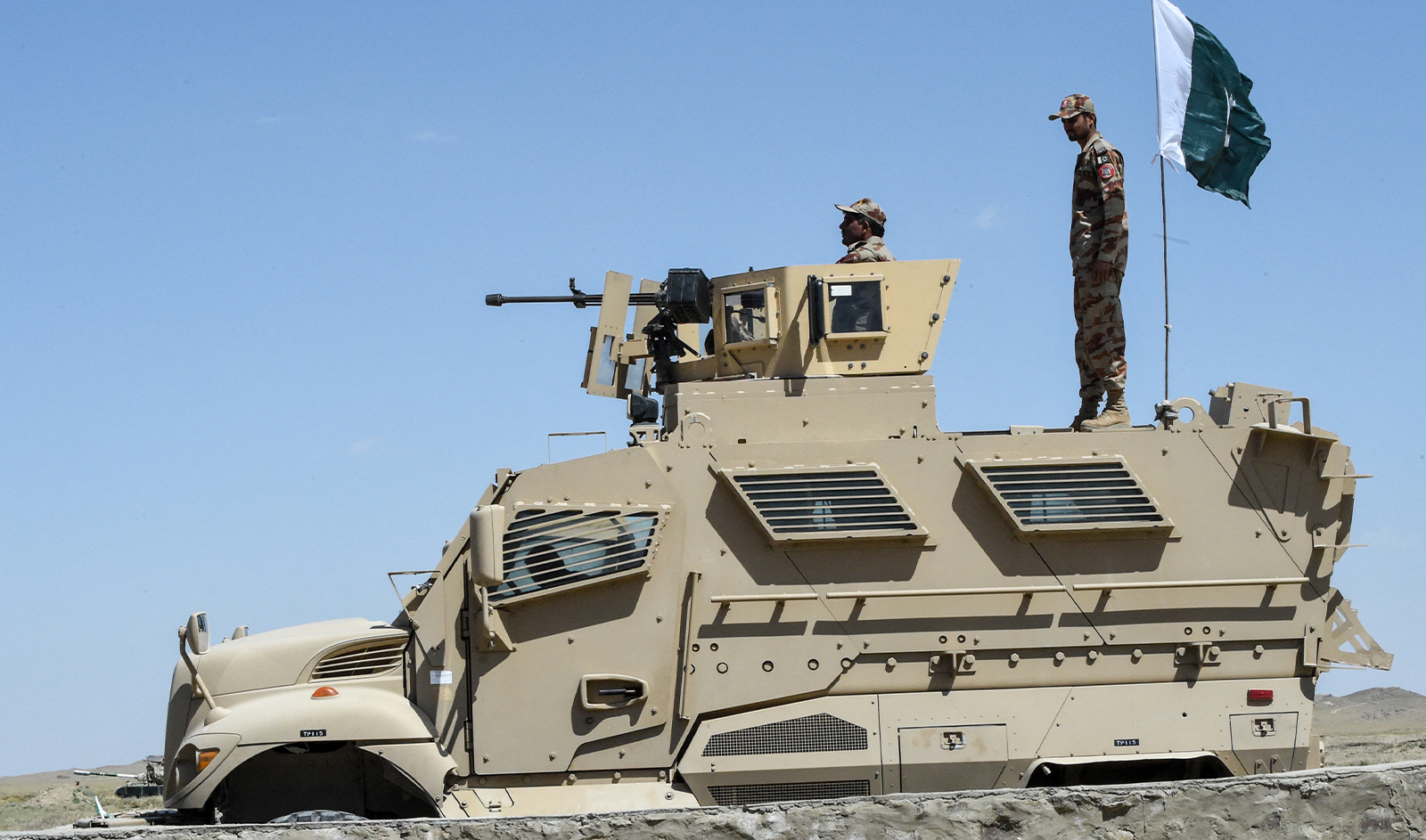 Security personnel of Pakistan's Frontier Corps stand on an armoured vehicle near a border crossing point between Pakistan and Afghanistan at the Pakistan's border town of Qila Saifullah in southwestern province of Balochistan on September 16, 2020. (AFP/File)