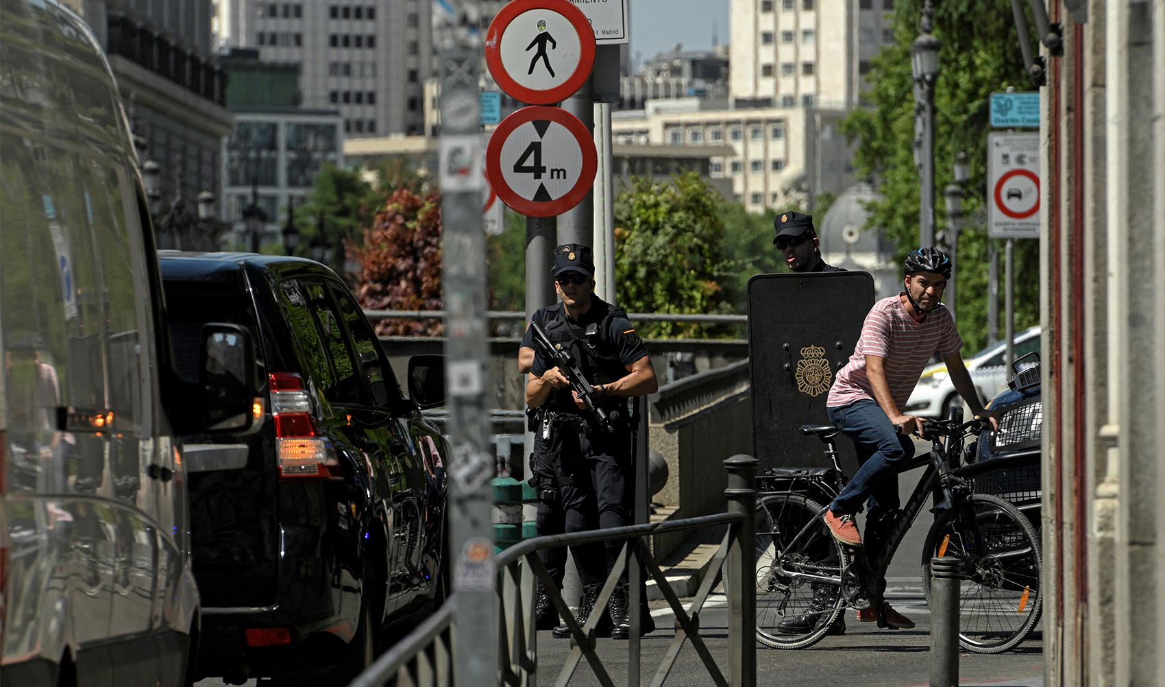 Spanish police officers cordon off the area near the Palacio Real in Madrid, Spain, on June 28, 2022. (AFP/File)