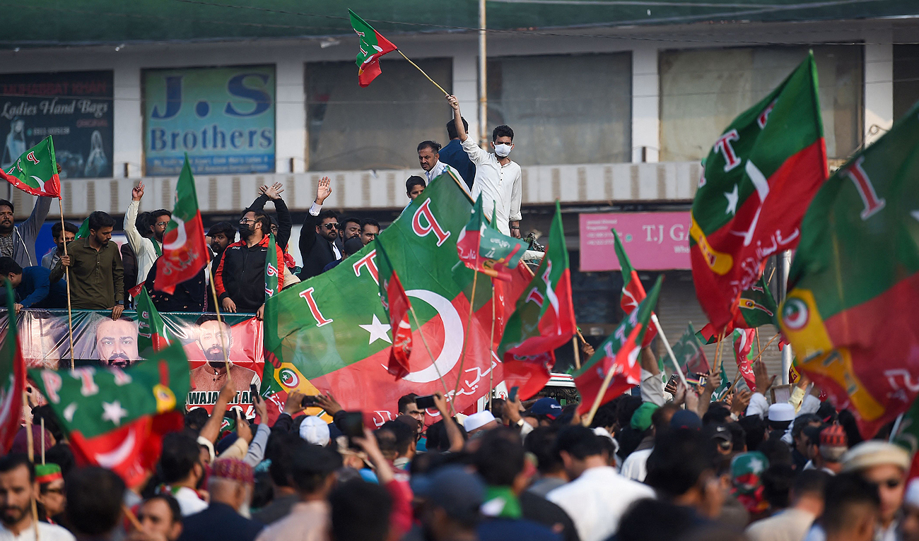 Supporters of Pakistan Tehreek-e-Insaf (PTI) party shout slogans and protest to demand the release of Pakistan’s jailed former prime minister Imran Khan, in Karachi on January 28, 2024. (AFP)