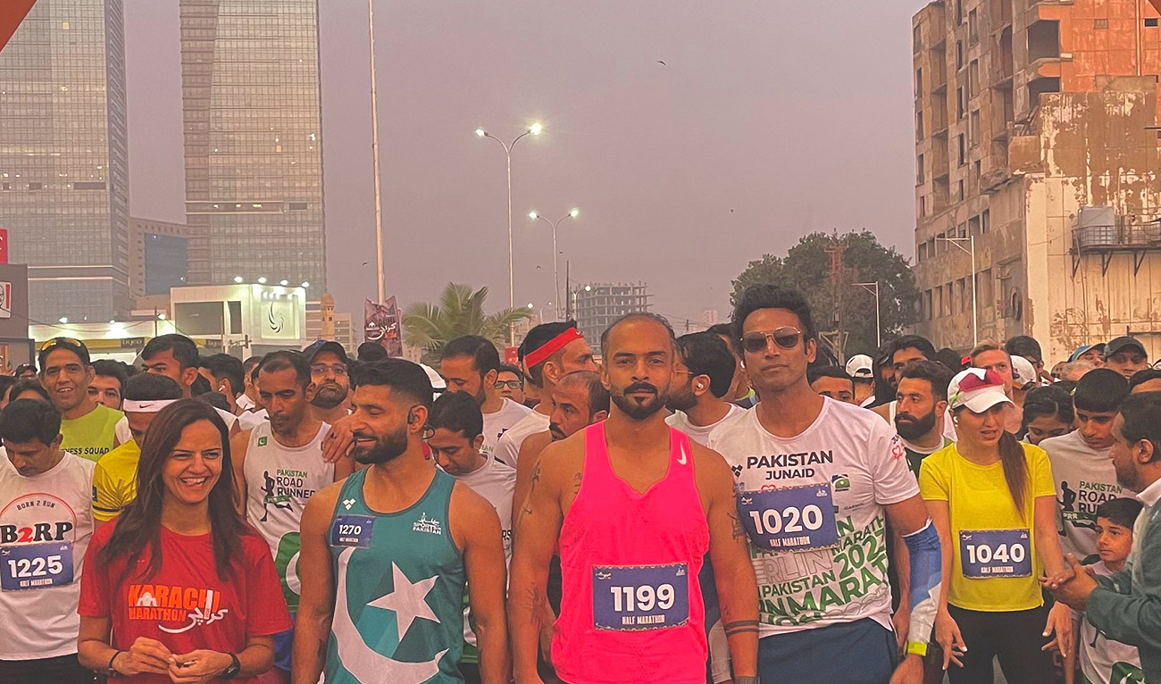 Runners gesture for a photograph ahead of the Karachi Marathon on January 28, 2024. (Photo courtesy: X/@junaidmuhammadd)
