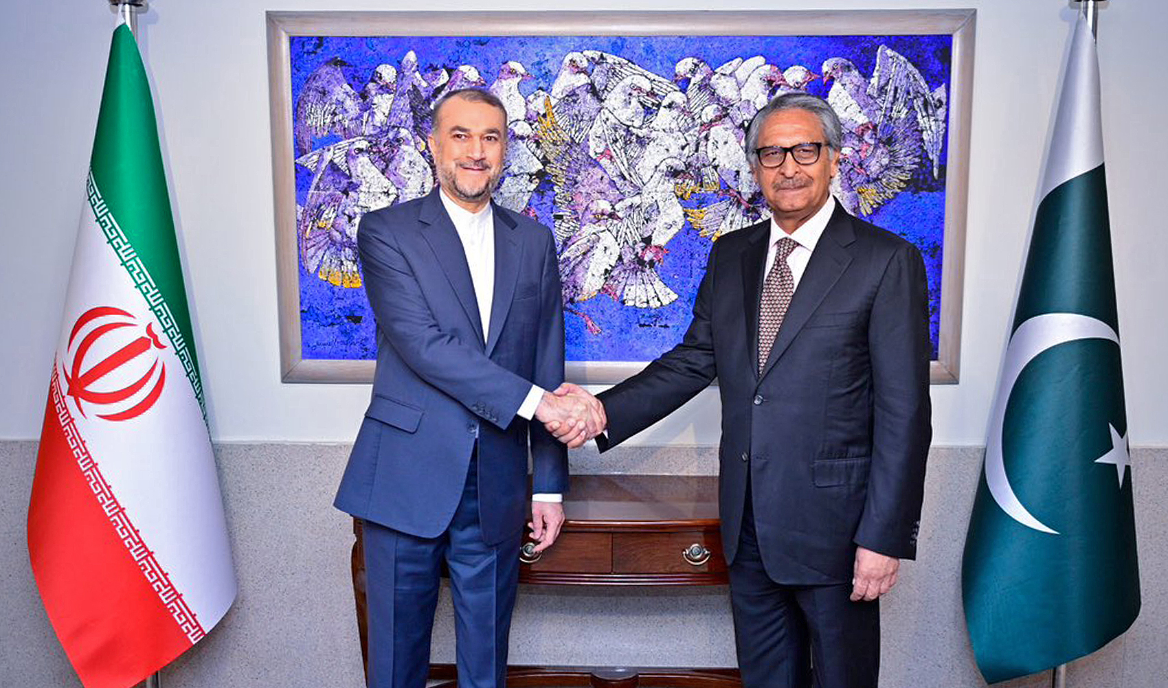 Pakistan's Caretaker Foreign Minister Jalil Abbas Jillani (right) poses for a picture with his Iranian counterpart, Amir-Abdollahian, in Islamabad, Pakistan, on January 29, 2024. (Pakistan's Foreign Office)