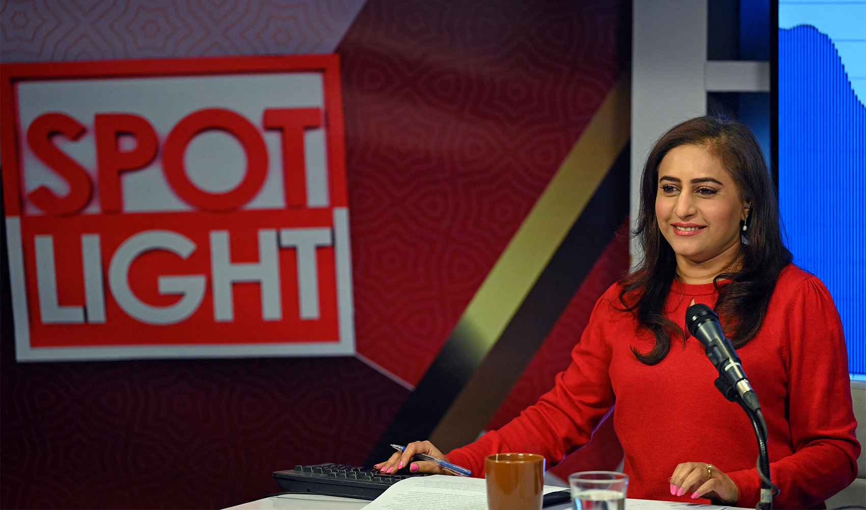 In this photograph taken on January 24, 2024, broadcast journalist and co-chairperson of Human Rights Commission of Pakistan, Munizae Jahangir presents her current affairs show on a news channel in Islamabad. (AFP)