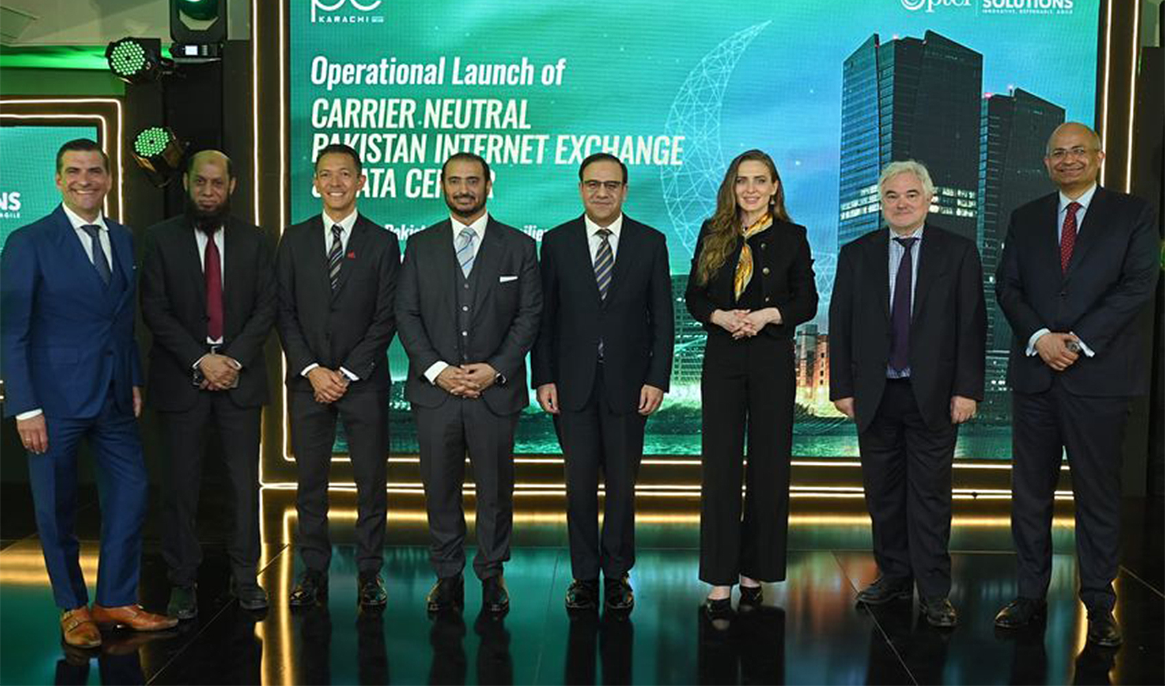 Pakistani and Chinese officials pose for a picture after signing an agreement to route China’s Internet traffic through Pakistan in Karachi, Pakistan on January 30, 2024. (Government of Pakistan)