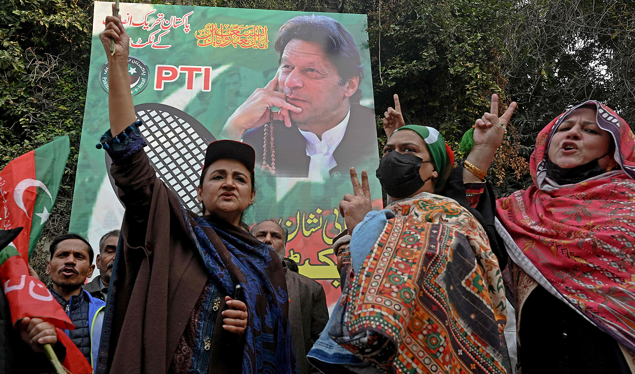 Supporters and activists of Pakistan Tehreek-e-Insaf (PTI) party chant slogans during an election campaign rally in Lahore on January 28, 2024, ahead of the upcoming general elections. (AFP)