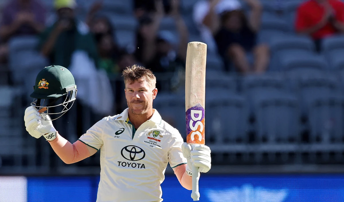 Australia’s David Warner celebrates reaching 150 runs on the first day of the first Test cricket match between Australia and Pakistan at Optus Stadium in Perth, Australia, on December 14, 2023. (AFP)