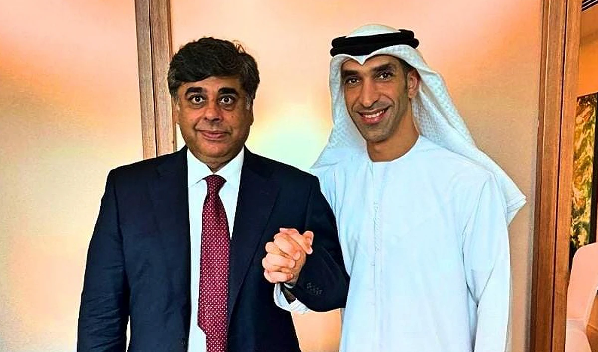 In this handout photo, taken and released by Ministry of Commerce, Pakistan's interim commerce minister, Dr. Gohar Ejaz (left), gestures with UAE’s state minister for foreign trade Dr. Thani Ahmed Al Zeyoudi following a meeting in Abu Dhabi on January 6, 2024. (Photo courtesy: GOP)