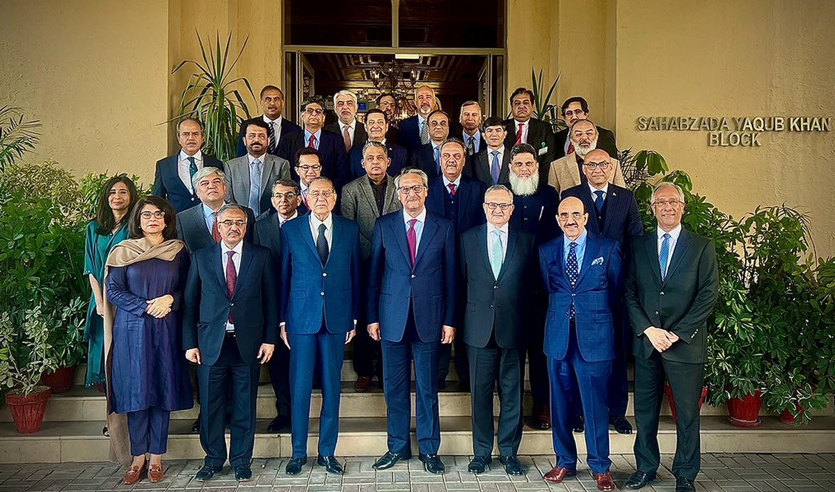 Pakistan's caretaker foreign minister, Jalil Abbas Jillani (center), gestures for a group photo with Pakistani diplomats at the Ministry of Foreign Affairs in Islamabad on January 6, 2024. (Photo courtesy: MOFA)