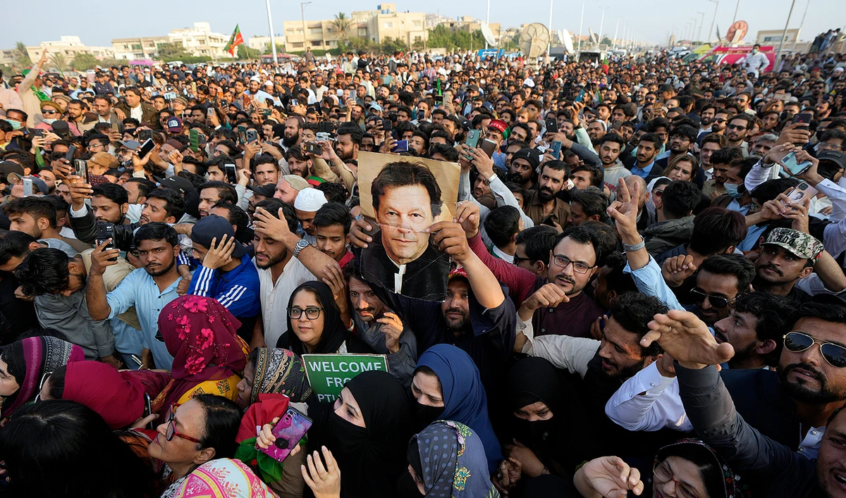 Supporters of Pakistan Tehreek-e-Insaf (PTI) a political party of former Pakistani Prime Minister Imran Khan, hold a rally in Karachi on January 14, 2024, against the decision of the election commission for the electoral symbol of a cricket bat. (AP)