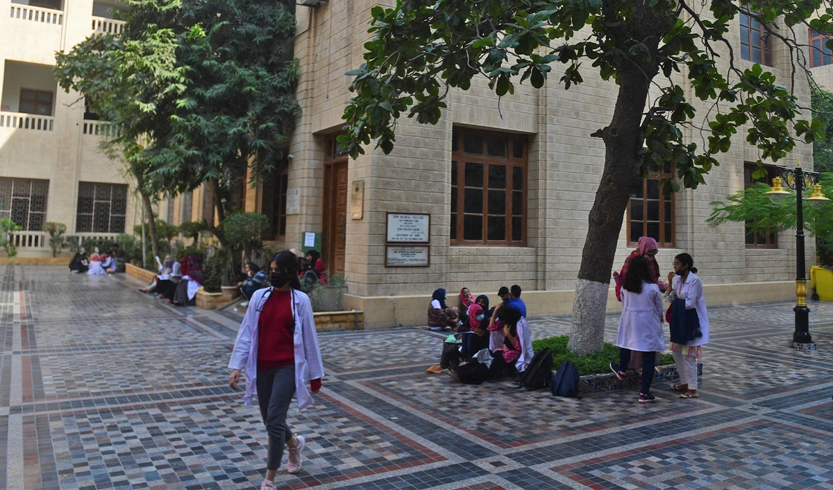 In this picture taken on January 13, 2022, students gather at a yard of the Dow University of Health Sciences, in Karachi, Pakistan. (AFP/File)