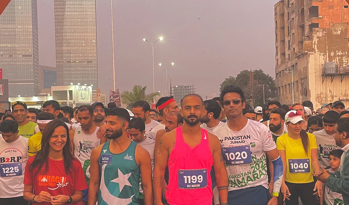 Runners gesture for a photograph ahead of the Karachi Marathon on January 28, 2024. (Photo courtesy: X/@junaidmuhammadd)