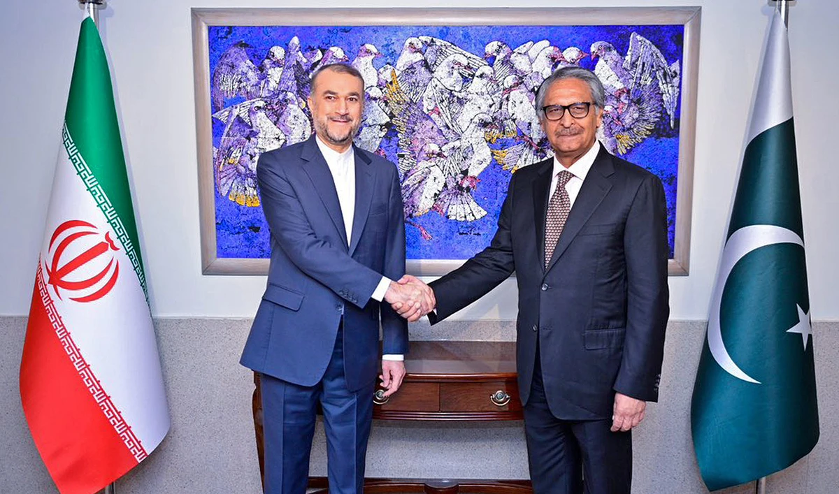 Pakistan's Caretaker Foreign Minister Jalil Abbas Jillani (right) poses for a picture with his Iranian counterpart, Amir-Abdollahian, in Islamabad, Pakistan, on January 29, 2024. (Pakistan's Foreign Office)