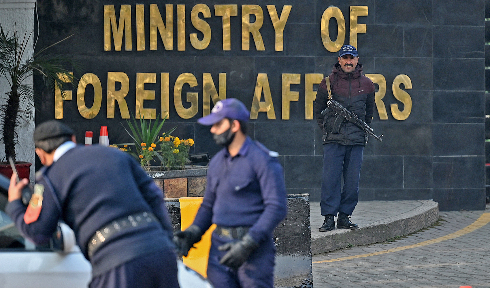 Pakistani police officers stand guard outside the Ministry of Foreign Affairs in Islamabad on January 18, 2024. (AFP/File)