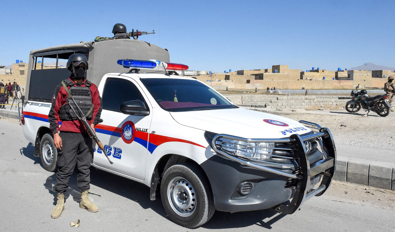 Security personnel stand guard at the site of a bomb blast in Quetta on February 1, 2024. (AFP)