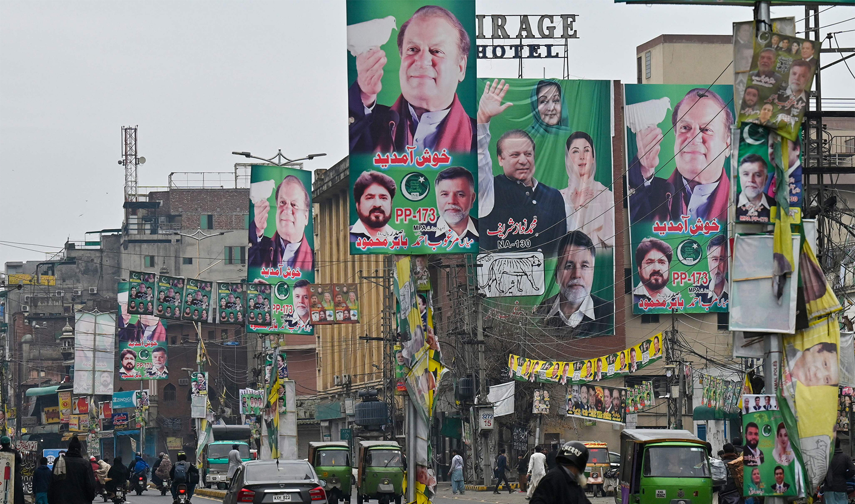 A street is festooned with posters of Pakistan's former Prime Minister and leader of the Pakistan Muslim League (PML) party, Nawaz Sharif in Lahore on February 4, 2024, ahead of national elections. (AFP)
