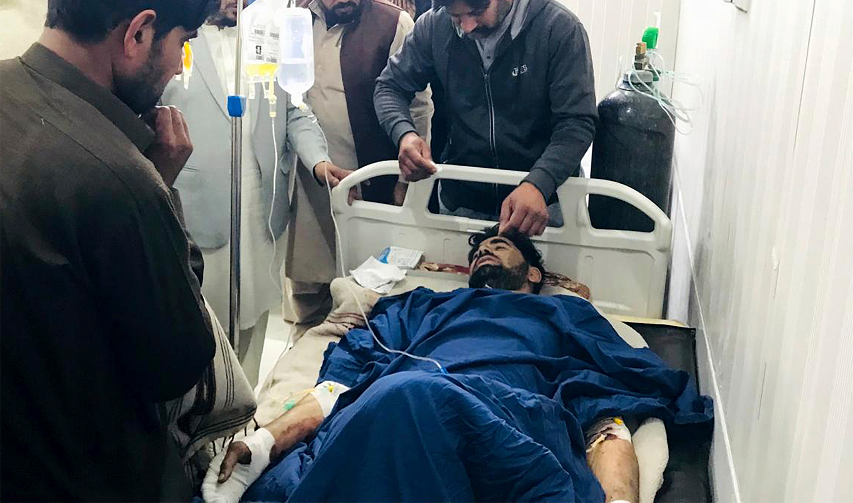 An injured victim is treated at a hospital in Dera Ismail Khan, Pakistan, on February 5, 2024. (AP)