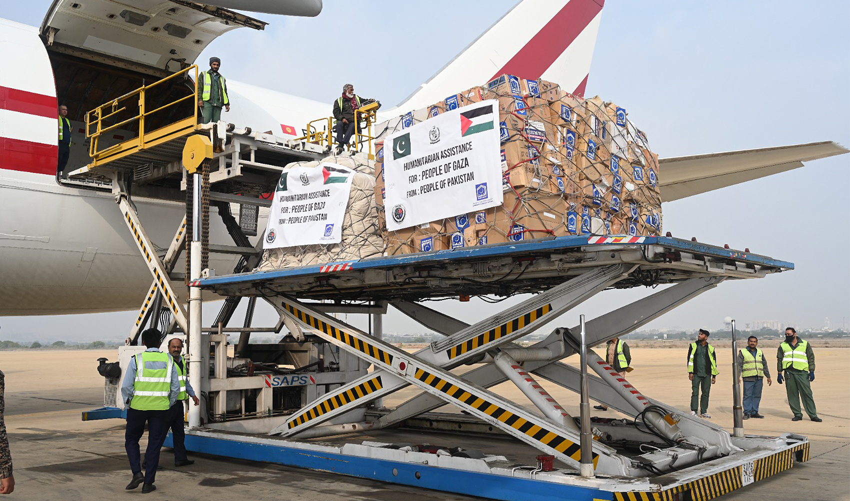 A photo released by National Disaster Management Authority (NDMA) on February 6, 2024, shows humanitarian aid bound for the Gaza Strip being loaded into an aircraft in Islamabad, Pakistan. (NDMA)